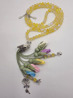 Natural Thermal Quartz Stones/ Multicolored Tulips with limited edition silver accent [كوارتز حراري] اليشم] 
تنويه: قد تختلف الألوان والإكسسوارات المعروضة قليلاً عن الواقع نتيجة لاختلاف إعدادات الشاشات والإضاءة أثناء التصوير.