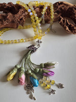 Natural Thermal Quartz Stones/ Multicolored Tulips with limited edition silver accent [كوارتز حراري] اليشم] 
تنويه: قد تختلف الألوان والإكسسوارات المعروضة قليلاً عن الواقع نتيجة لاختلاف إعدادات الشاشات والإضاءة أثناء التصوير.