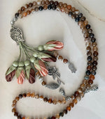 PRE-ORDER - Natural Agate Stones/ Multicolored Tulips  [عقيق]                                  مدة التنفيذ ١٠ أيام من تاريخ الطلب
تنويه: قد تختلف بعض ألوان واكسسوارات المنتج قليلاً عن الصور المعروضة وذلك حسب توفرها