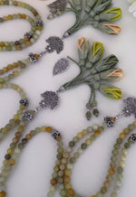 PRE-ORDER - RAMADAN COLLECTION - LIMITED EDITION - Green Onix Natural Stones/ Lime Tulips [أونكس أخضر]                    تستغرق مدة التنفيذ اسبوعين تقريباً
تنويه: قد تختلف ألوان وبعض اكسسوارات المنتج قليلاً عن الصور المعروضة وذلك حسب توفرها